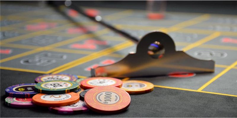 Poker chips on a roulette table; JackpotCity Casino Blog