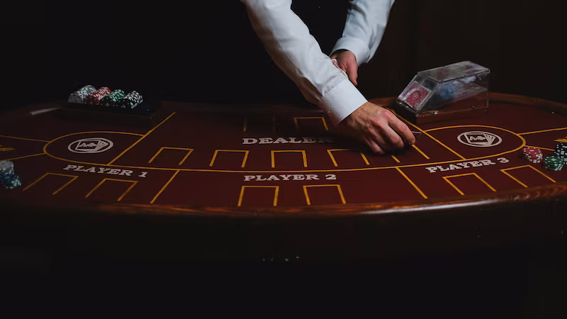 Dealer at blackjack table