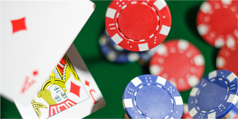 Blackjack cards face up next to casino chips