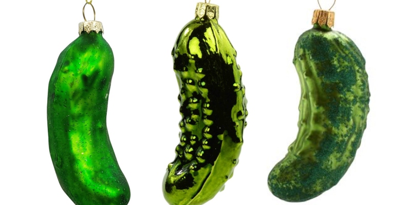three Christmas pickle ornaments, used for the tradition of Weihnachtsgurke 
