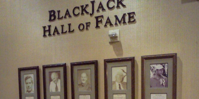 A wall of portraits with the members of the Blackjack Hall of Fame; Spin Casino Blog