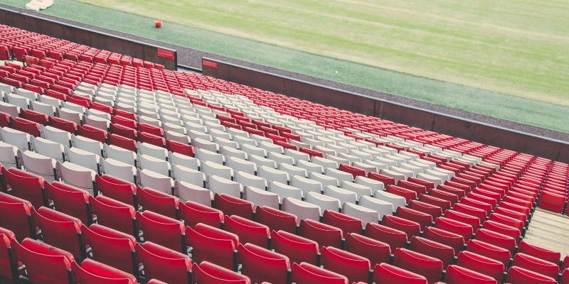 A photograph of empty seats at Liverpool’s Anfield stadium.