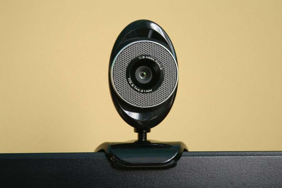 A webcam sitting on top of a computer monitor