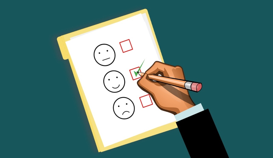 An illustration of a hand filling out a customer service survey