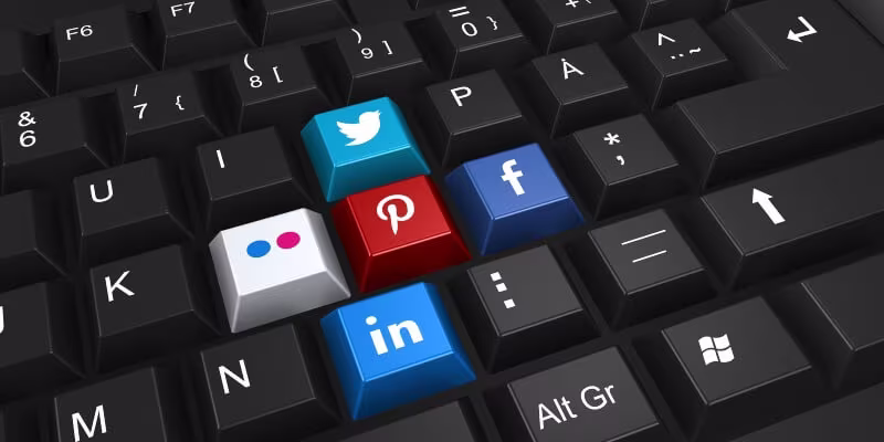 A computer keyword with popular social media icons as keys
