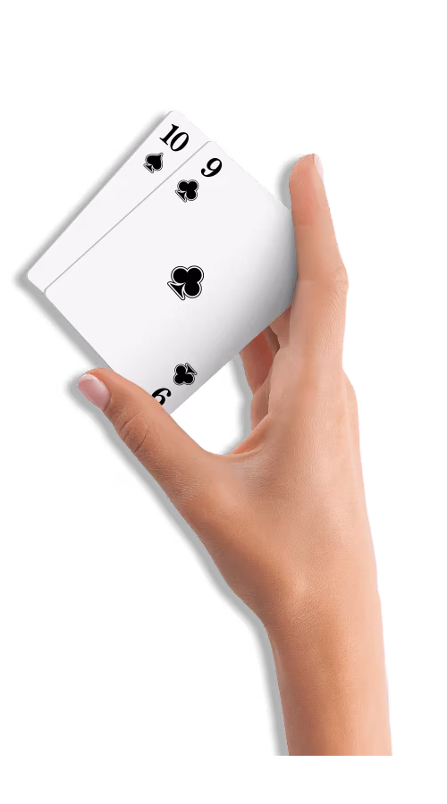 Hand holding two casino cards