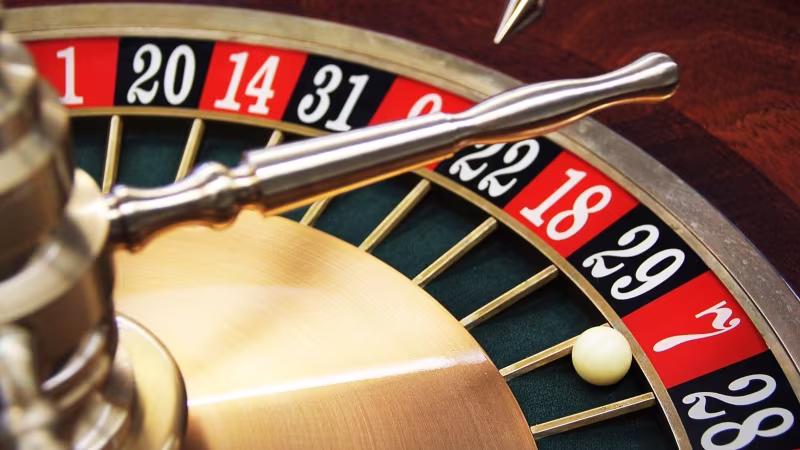 roulette wheel and ball on 7 red